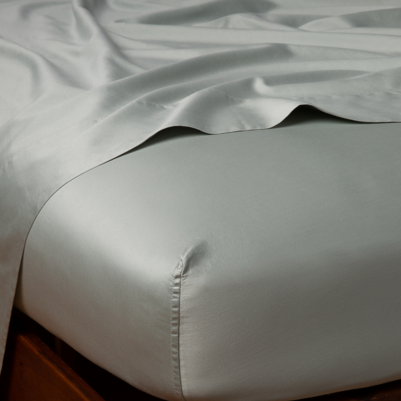 Bella Notte Bria fitted sheet in Cenote fabric, California King size, showing smooth, soft fabric with neat corner stitching.