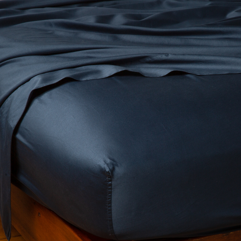 Bella Notte Bria fitted sheet in Cenote color, luxurious cal-king size, soft and smooth bedding fabric for a stylish bedroom look.