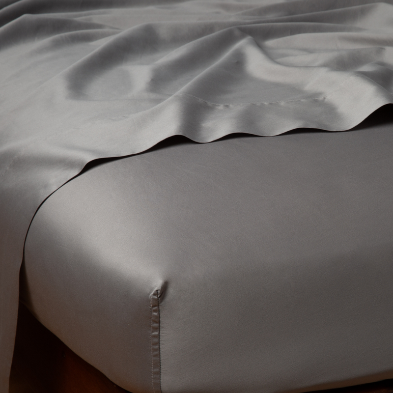 Bella Notte Bria fitted sheet in Cenote fabric, California King size, showcasing soft, luxurious bedding with a smooth, tailored fit.