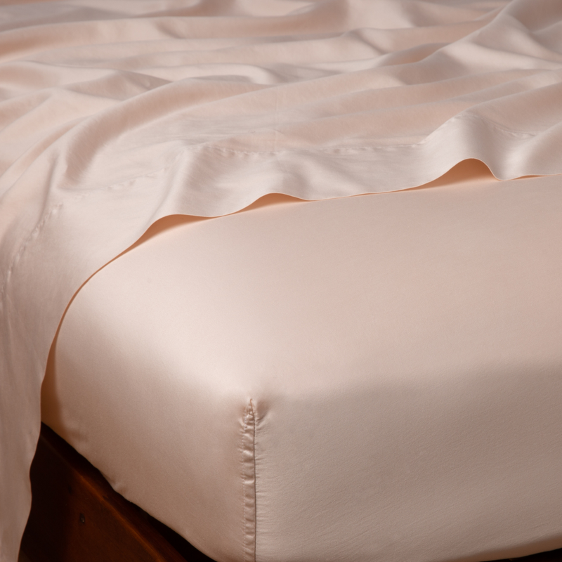 Bella Notte Bria fitted sheet in Cenote color, soft cotton bedding for California king size bed.