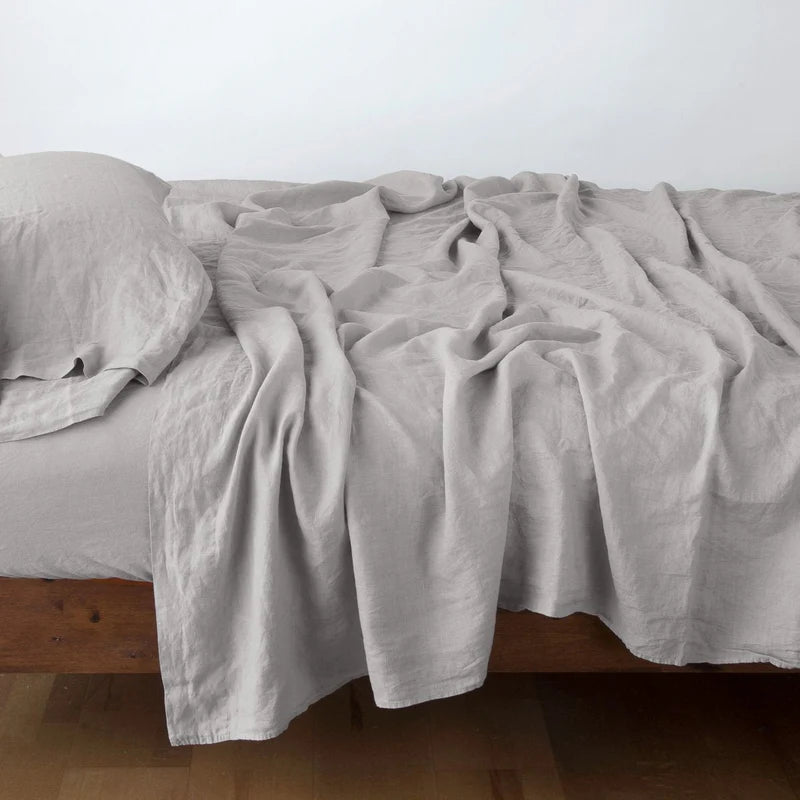 Bella Notte linen flat sheet in autumn color, king size, soft and smooth fabric, neatly spread on a bed.