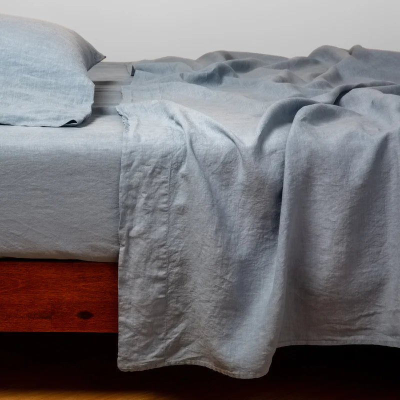 Bella Notte linen flat sheet in autumn color, king size, smooth and soft fabric draped neatly.