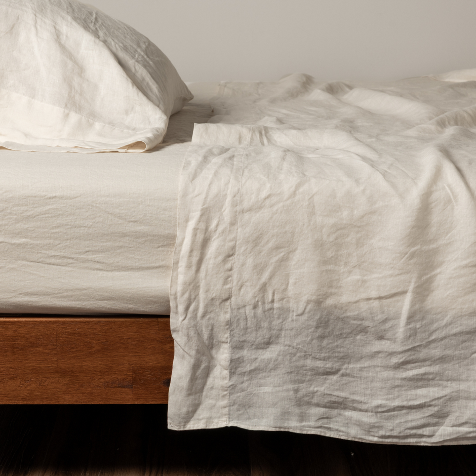 Natural linen flat sheet by Bella Notte, showcasing soft, breathable fabric with a smooth, flat surface in a neutral color.