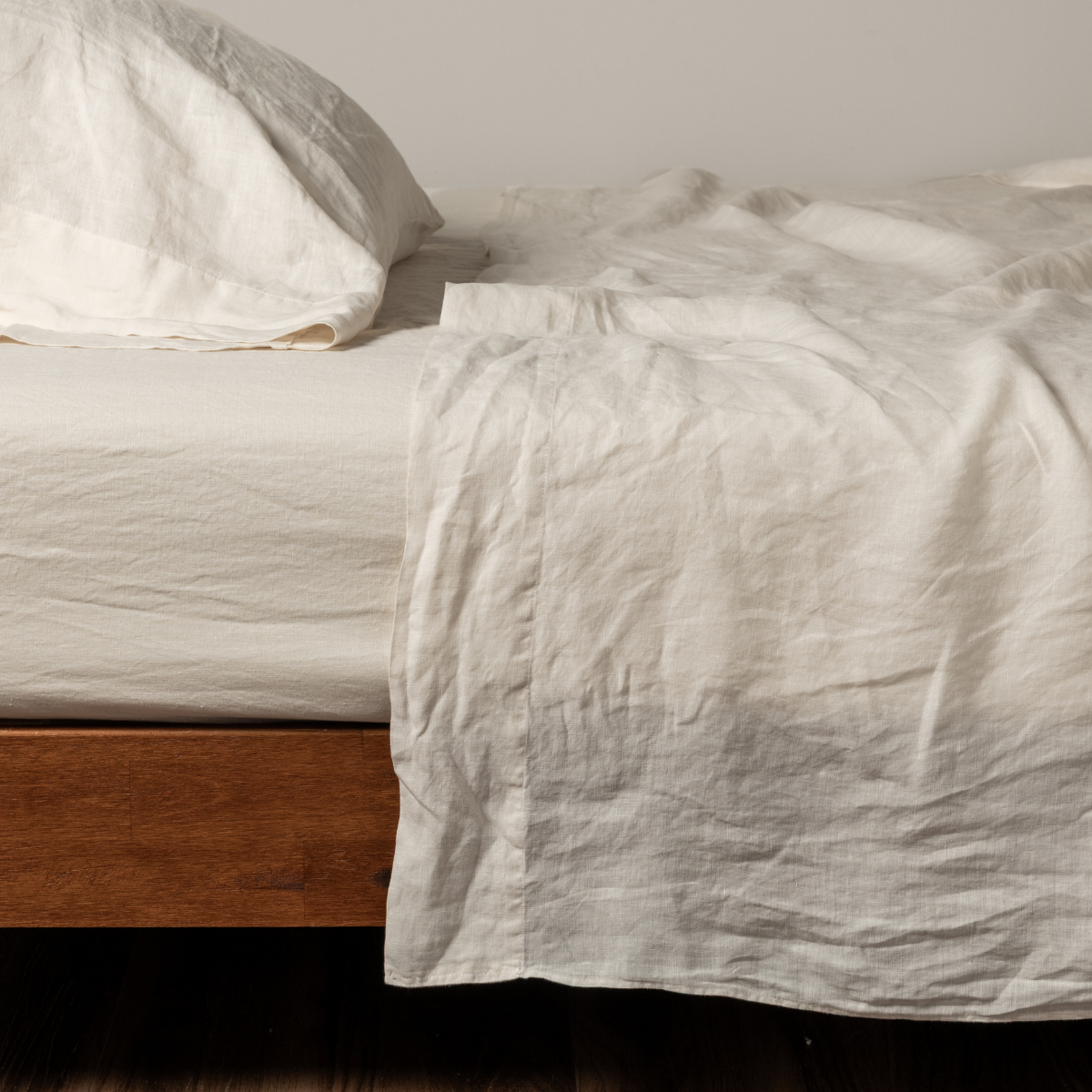 Natural linen flat sheet by Bella Notte, showcasing soft, breathable fabric with a smooth, flat surface in a neutral color.