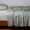 Bella Notte Cenote King Bria Flat Sheet displayed flat, showcasing soft, luxurious fabric and elegant design details.