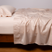 Bella Notte Cenote King Bria Flat Sheet showing soft, luxurious white fabric with subtle texture and elegant edges.
