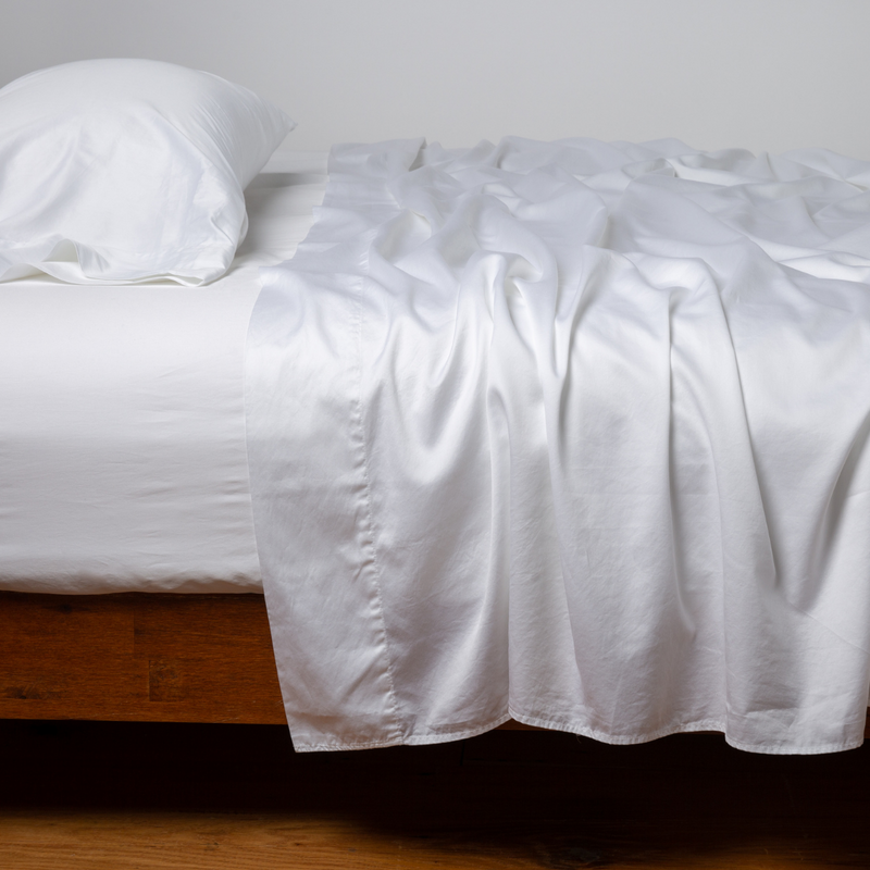Bella Notte Cenote King Bria Flat Sheet in soft, luxurious fabric laid flat showing smooth, elegant design.