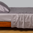 Bella Notte Cenote King Bria Flat Sheet spread flat, showcasing soft, elegant fabric with subtle textured design.
