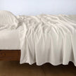 Bella Notte Madera Luxe flat sheet with cuff edge in cloud king size, showcasing soft, luxurious fabric and elegant design details.