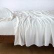 Bella Notte Madera Luxe flat sheet in cloud color with cuff edge design, king size, showcasing soft, luxurious bedding fabric.