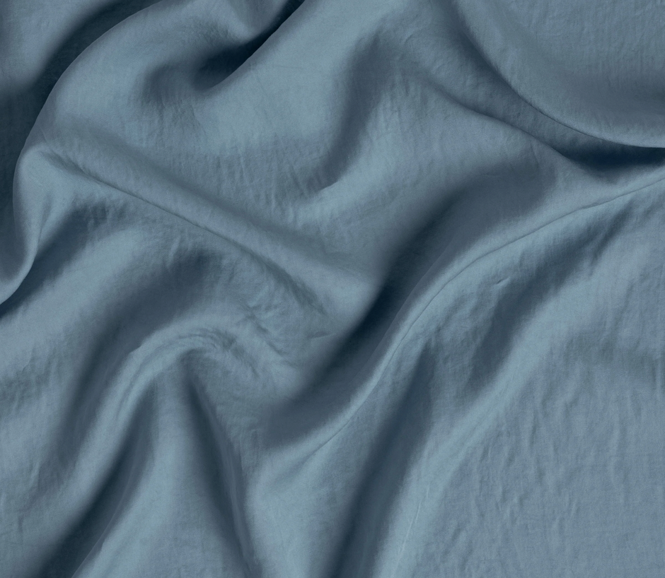 Bella Notte Madera Luxe flat sheet with cuff edge, king size, soft fabric, and elegant design, shown in a cozy bedroom setting.