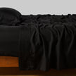 Bella Notte Madera Luxe flat sheet in cloud king size with cuff edge, showcasing soft, luxurious fabric and elegant design.