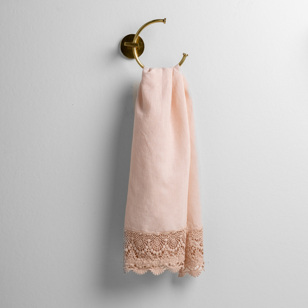 White Bella Notte Mattine Guest Towel with soft, textured fabric, displayed folded on a bathroom countertop.