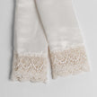 Bella Notte Paloma Pillowcase with lace edge, featuring elegant lace trim on soft fabric for a luxurious bedroom accent.
