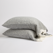 Bella Notte Allora Lace Pillowcase in Cenote, natural close-up showing delicate lace details on a luxurious pillowcase.
