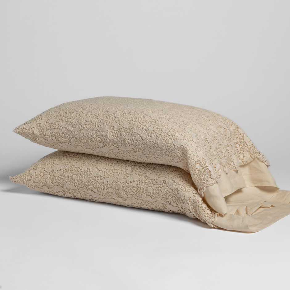 Natural Bella Notte Allora lace pillowcase with intricate lace details on soft fabric in a natural color.