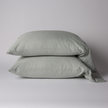 Bella Notte Bria Pillowcase in Cenote fabric, showcasing a soft, luxurious fabric with intricate stitching and elegant design.