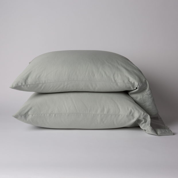 Bella Notte Bria Pillowcase in Cenote fabric, showcasing a soft, luxurious fabric with intricate stitching and elegant design.