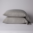 Bella Notte Bria pillowcase in Cenote fabric, showcasing soft, luxurious cotton with elegant stitching detail.