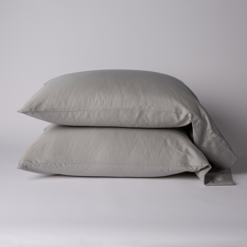 Bella Notte Bria pillowcase in Cenote fabric, showcasing soft, luxurious cotton with elegant stitching detail.