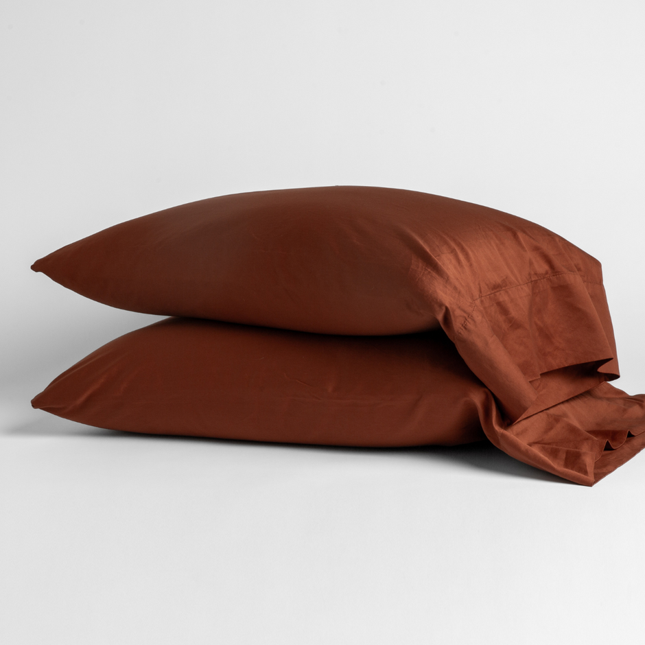Pair of Bella Notte Bria pillowcases in soft autumn-colored fabric, showcasing elegant, high-quality bedding.