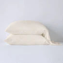 Bella Notte Madera Luxe pillowcase with cuff edge, soft fabric in cloudy color, showcasing elegant design and smooth texture.