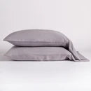 Bella Notte Madera Luxe pillowcase with cuff edge, soft fabric, and cloud pattern for luxurious bedroom decor.