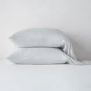 Bella Notte Madera Luxe pillowcase with cuff edge, soft fabric, and cloud color, showcasing elegant bedding detail.