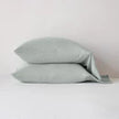 Bella Notte Madera Luxe pillowcase with cuff edge, soft fabric, and elegant cloud color, showcasing its luxurious design.