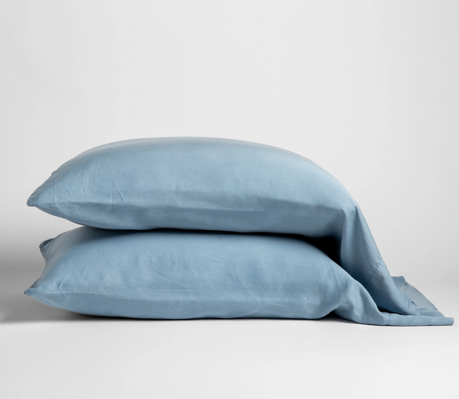 Bella Notte Madera Luxe pillowcase with cuff edge in soft cloud color, featuring smooth fabric and elegant design.