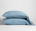 Bella Notte Madera Luxe pillowcase with cuff edge in soft cloud color, featuring smooth fabric and elegant design.