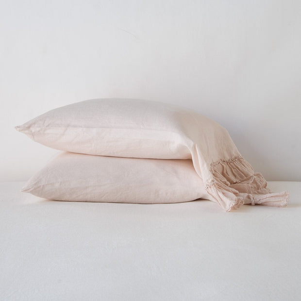 White linen Whisper Pillowcase by Bella Notte, showing soft fabric and elegant stitching on a standard-sized pillow.