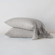White linen Whisper Pillowcase by Bella Notte, showcasing smooth fabric and elegant stitching on a standard-sized pillow.