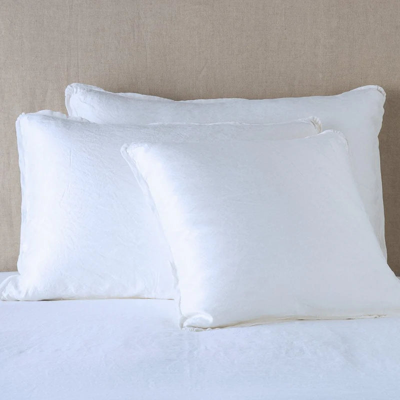 Bella Notte Paloma Sham in warm autumn tones, showcasing elegant fabric and detailed stitching for a luxurious bedroom decor.