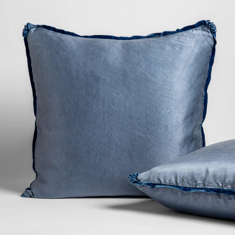 Bella Notte Paloma Sham in autumn euro style with soft fabric and detailed stitching, displayed on a bed.