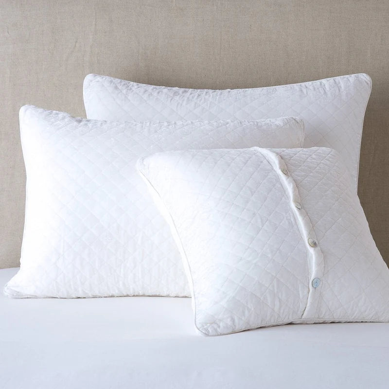 Bella Notte silk velvet quilted sham featuring a luxurious autumn-colored euro design with tufted quilting.