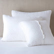 Bella Notte silk velvet quilted sham featuring a luxurious autumn-colored euro design with tufted quilting.