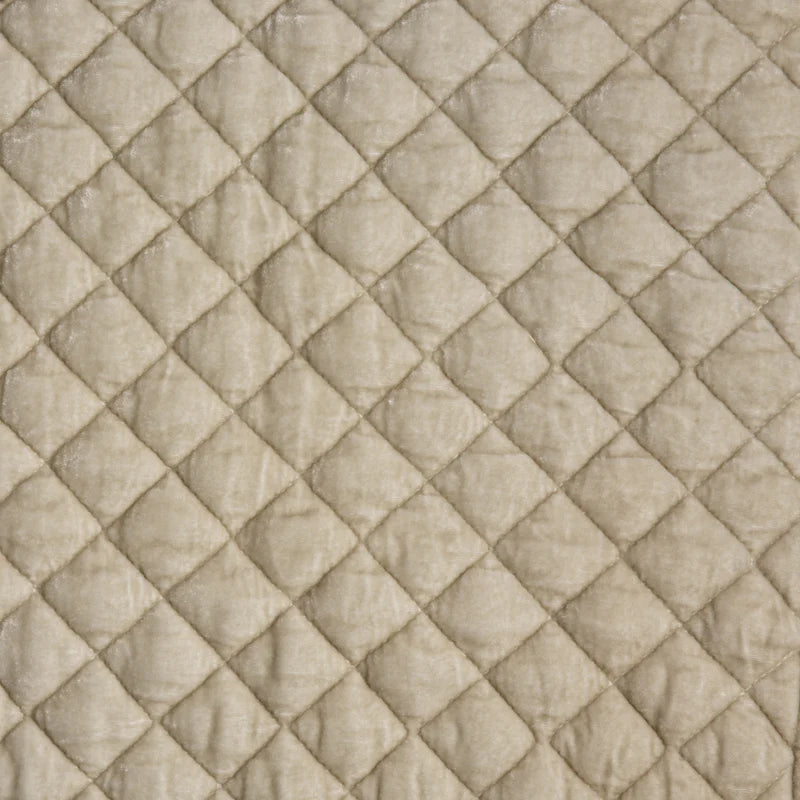 Bella Notte silk velvet quilted sham featuring a luxurious, textured design in warm autumn tones, designed for elegant bedding.