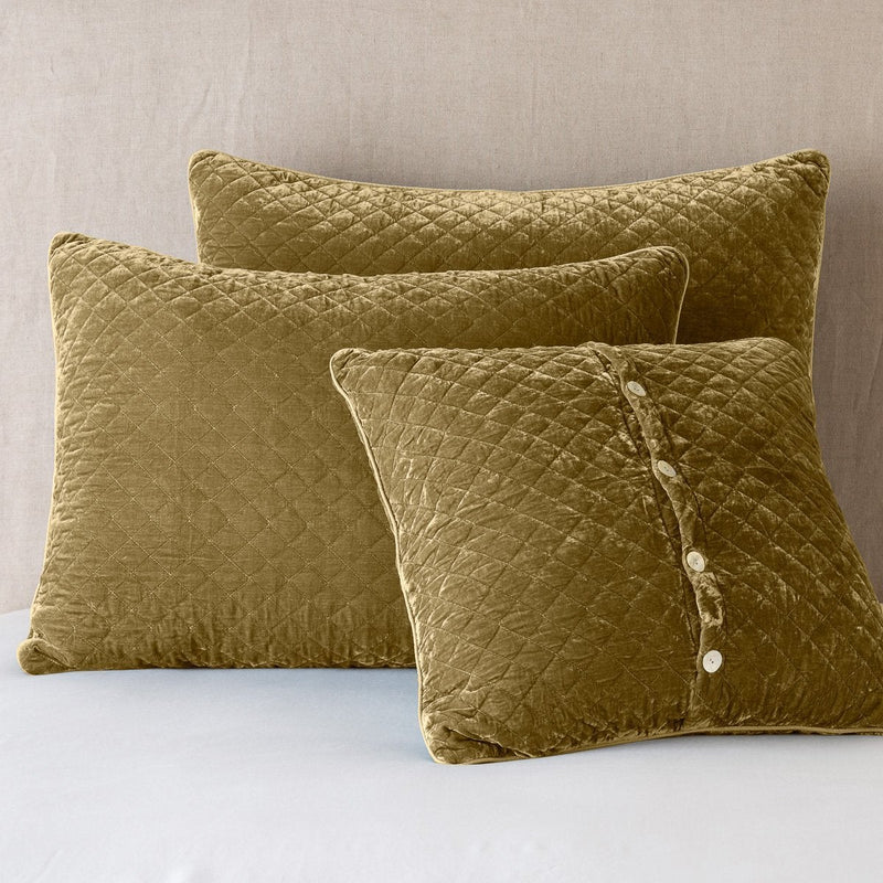 Bella Notte silk velvet quilted sham featuring a textured, luxurious design in rich autumn tones, showcasing elegant bedding decor.