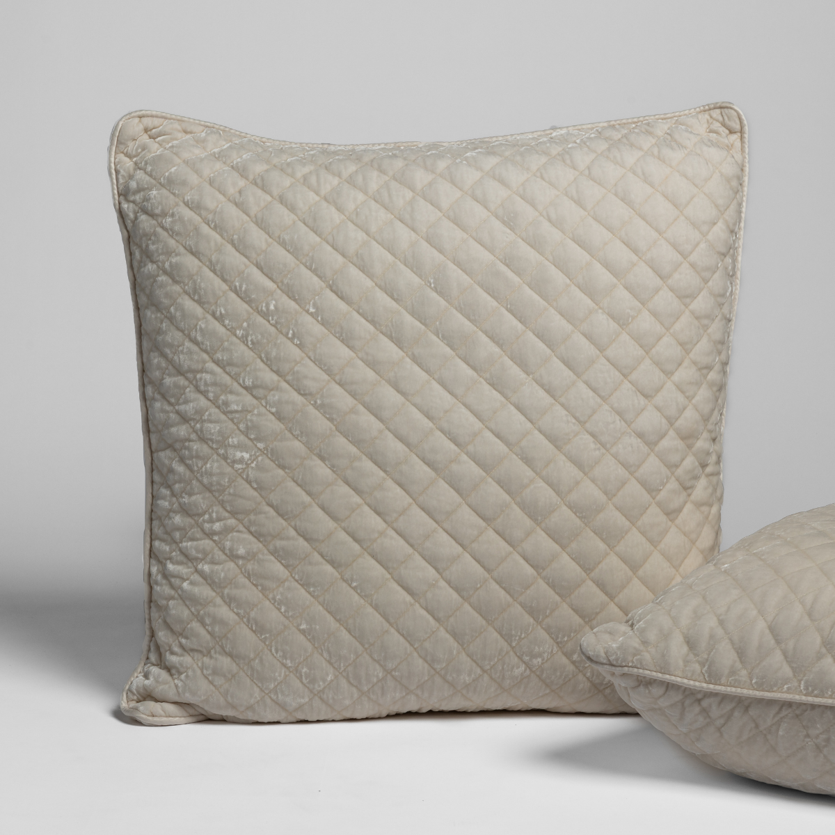 Cream silk velvet quilted sham by Bella Notte with a plush, textured design and elegant quilting for a luxurious bedroom look.