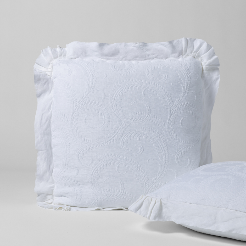 Bella Notte Marisette Sham in cloud color, showcasing luxurious fabric and elegant European-style design for a cozy bedroom look.
