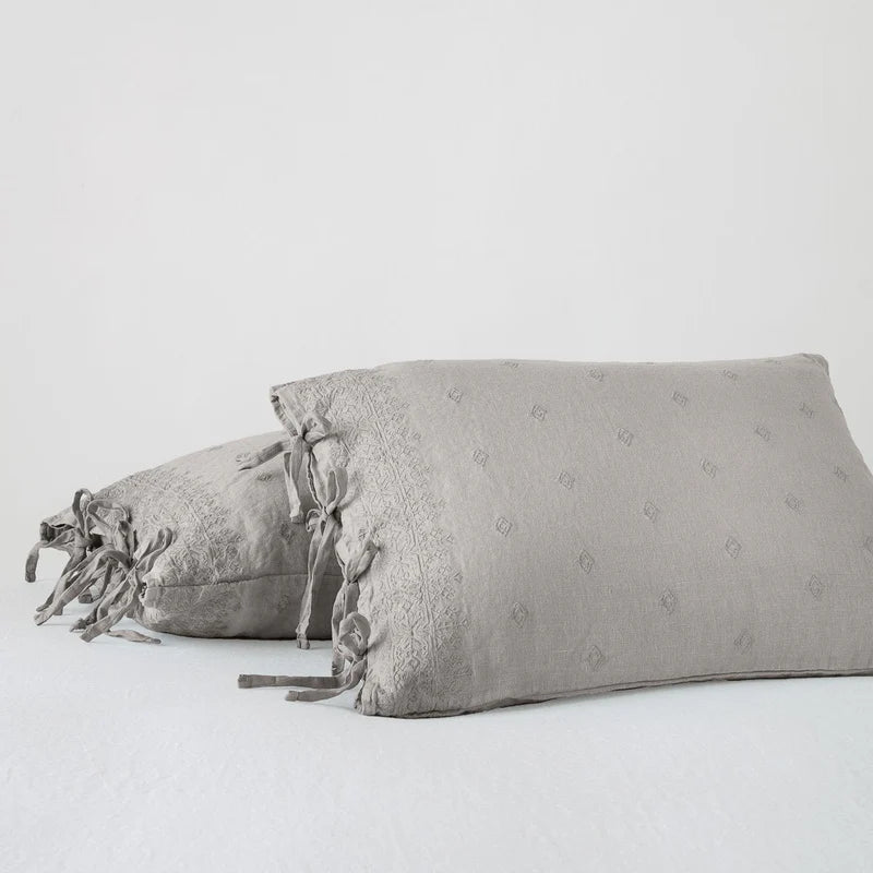 French lavender Bella Notte Ines Sham with intricate embroidery and soft silk fabric for a luxurious bedroom decor.