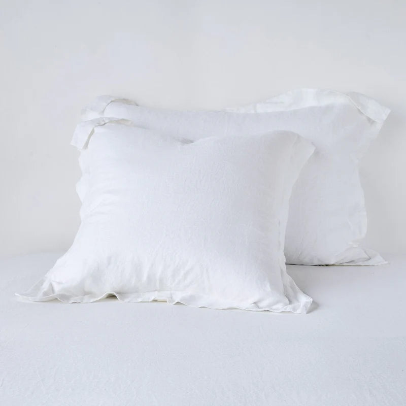 Bella Notte French Lavender linen sham showcasing soft, textured fabric with elegant piping detail for a luxurious bedroom accent.