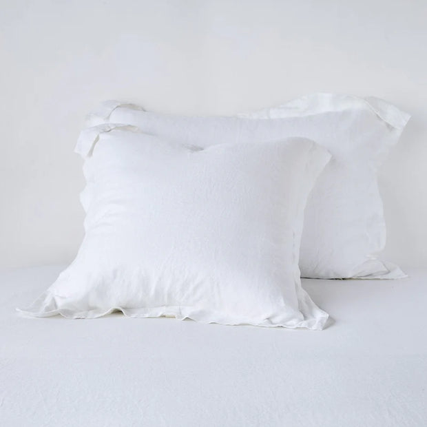 Bella Notte French Lavender linen sham showcasing soft, textured fabric with elegant piping detail for a luxurious bedroom accent.