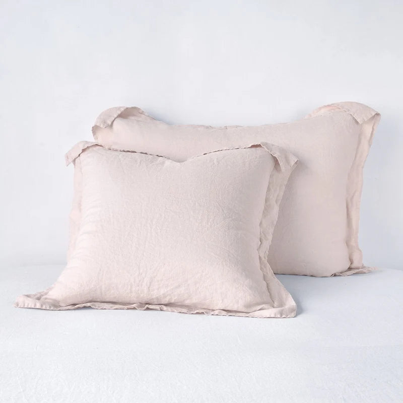 Bella Notte French Lavender linen sham with soft, textured fabric and decorative edge for elegant bedroom decor.