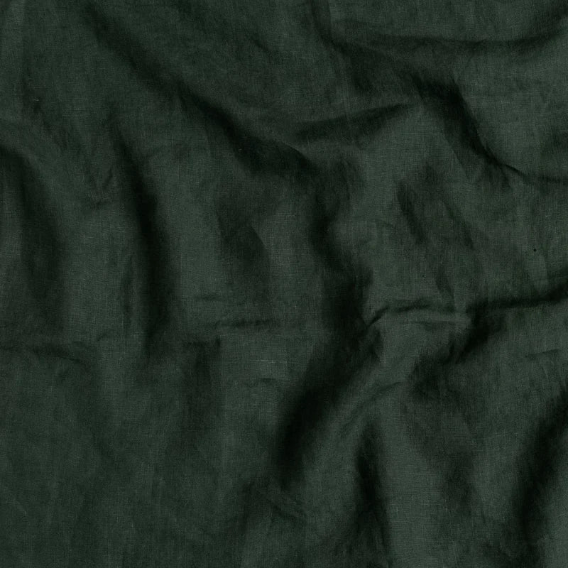 Bella Notte linen sham in French lavender color, plush fabric with elegant stitching, designed for a luxurious bedding look.