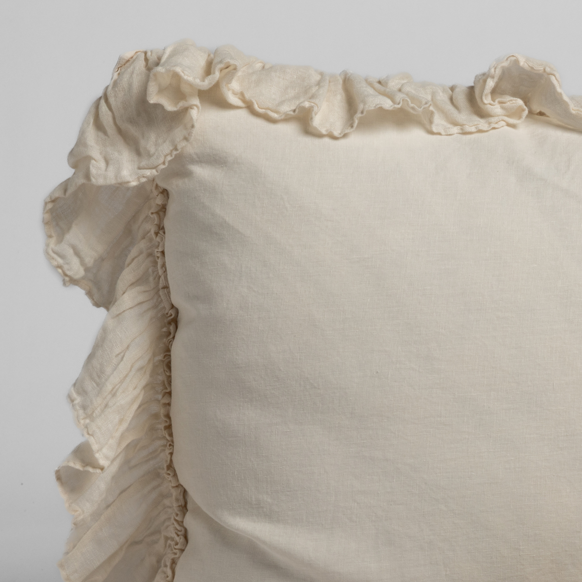 Natural linen Whisper sham by Bella Notte featuring soft, textured fabric and elegant corner detailing for a sophisticated bedroom look.