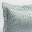 Bella Notte Cirillo Sham in pearl, king size, showcasing soft, luxurious fabric with elegant stitching and a refined finish.