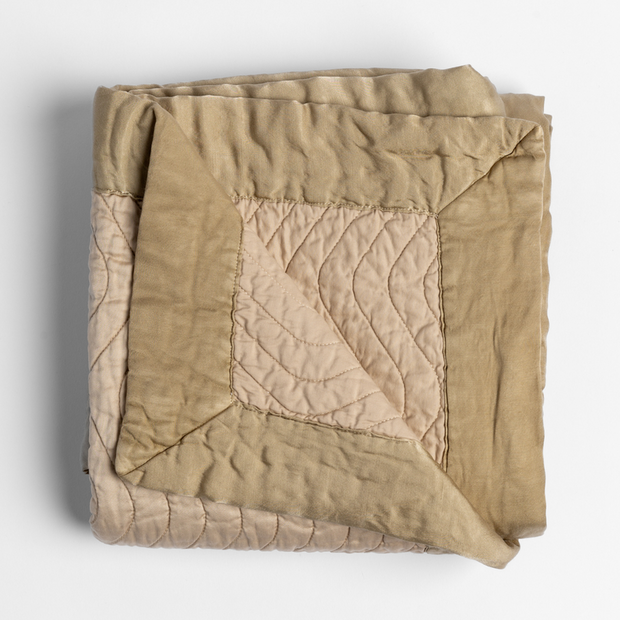 Bella Notte Cirillo Throw Blanket in warm autumn tones, soft fabric with a cozy, textured design for comfortable lounging.