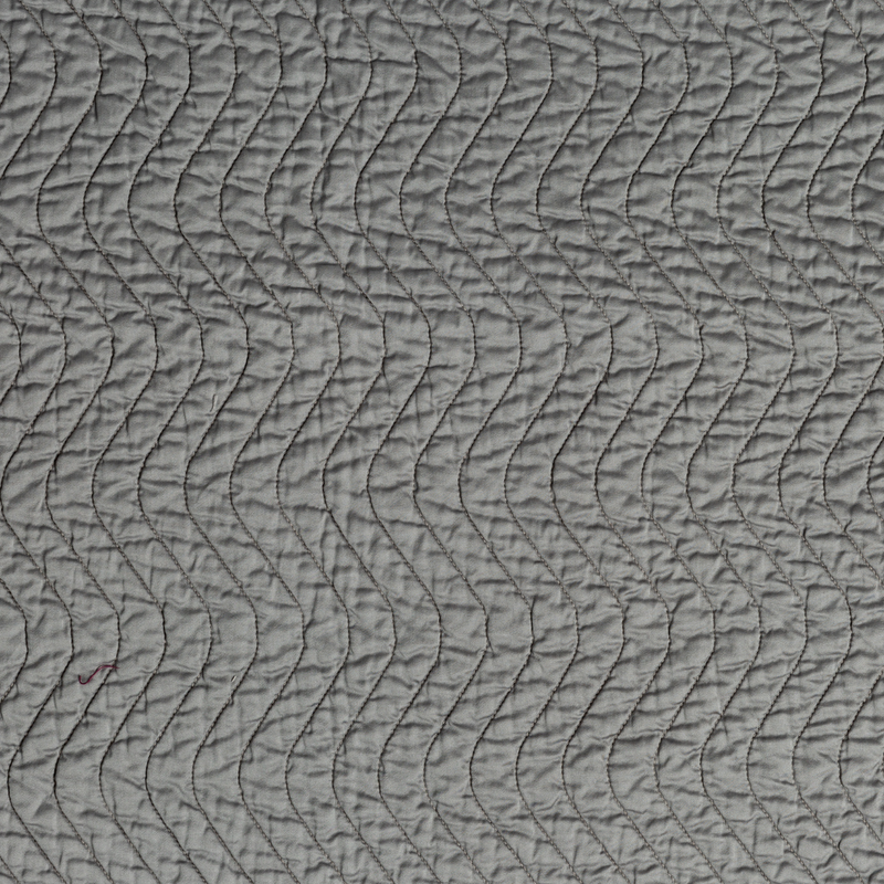 Bella Notte Cirillo throw blanket in warm autumn tones, soft fabric with a cozy, stylish design for comfortable lounging.